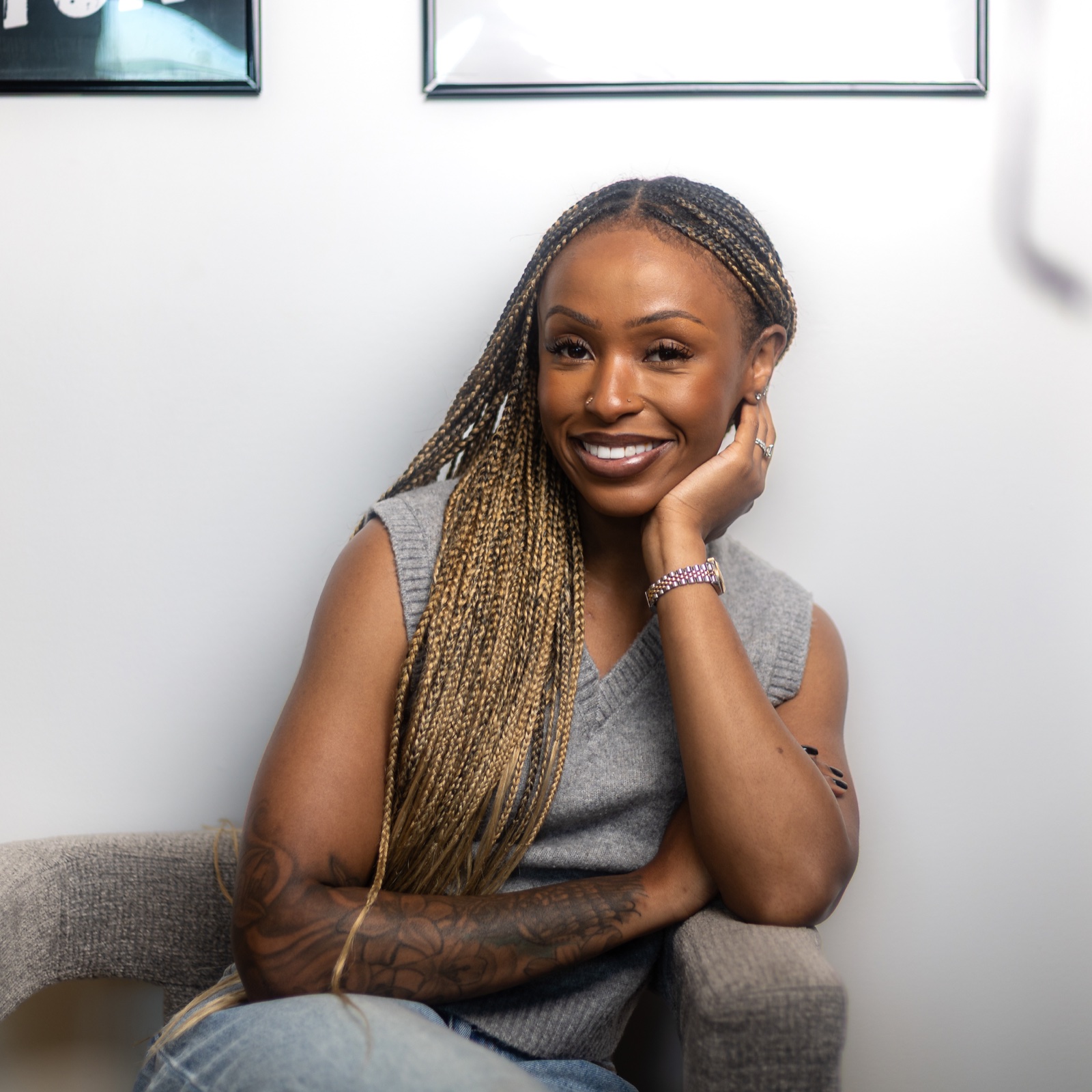 Detroit personal branding portrait of a business owner seated on a couch